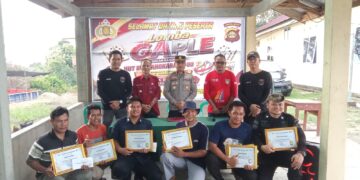 Tutup Rangkaian HUT Bhayangkara ke‑80: Kapolsek Rawas Ulu Serahkan Penghargaan Pemenang Lomba Gaple