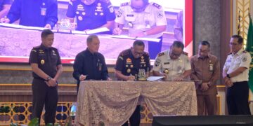 Penandatanganan MoU Sidang Elektronik Di Sumsel, Tingkatkan Efisiensi dan Transparansi